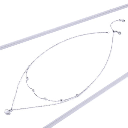 Collar de cadena de doble capa con colgante de corazón
