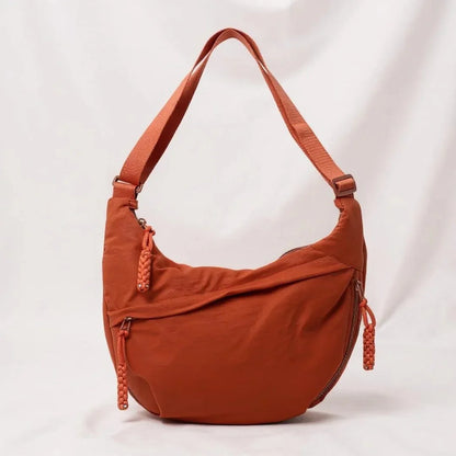 Mirella – Bolso bandolera antirrobo con forma de media luna